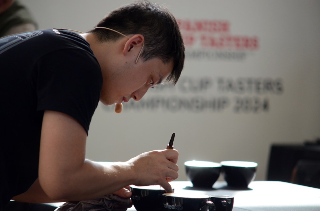 Junzhi Liu from Brew Coffee competing in the Spanish Latte Art Championship at 2024 Barcelona Coffee Awards